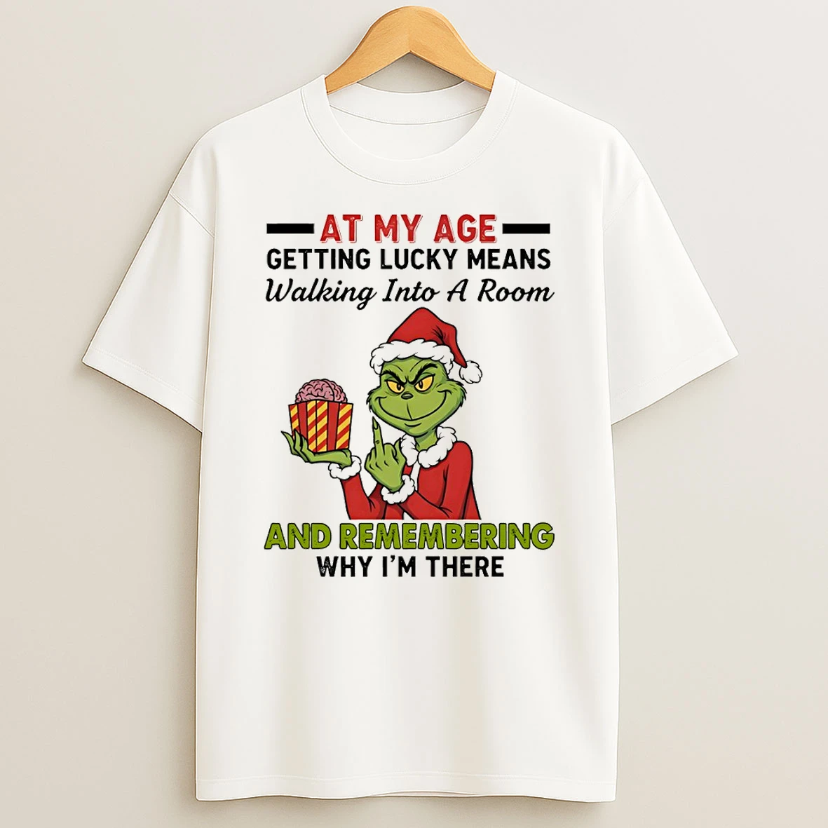 Funny Grinch Santa Hat At My Age Getting Lucky Means Walking Into A Room And Remembering Merry Christmas Tshirt Hoodie