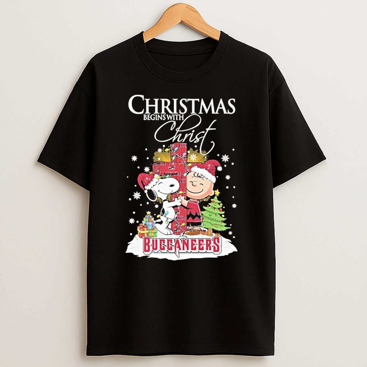 The Peanuts X Tampa Bay Buccaneers Christmas Begins With Christ Tshirt Hoodie