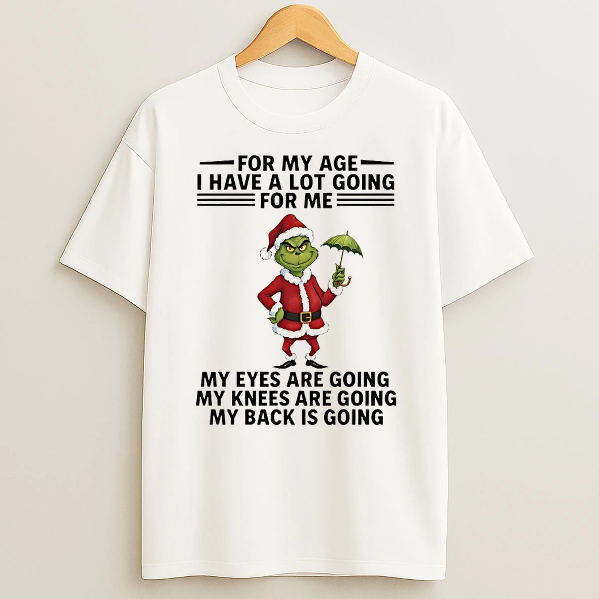 Grinch Santa Hat For My Age I Have A Lot Going For Me My Eyes Are Going My Knees Are Going Christmas T Shirt