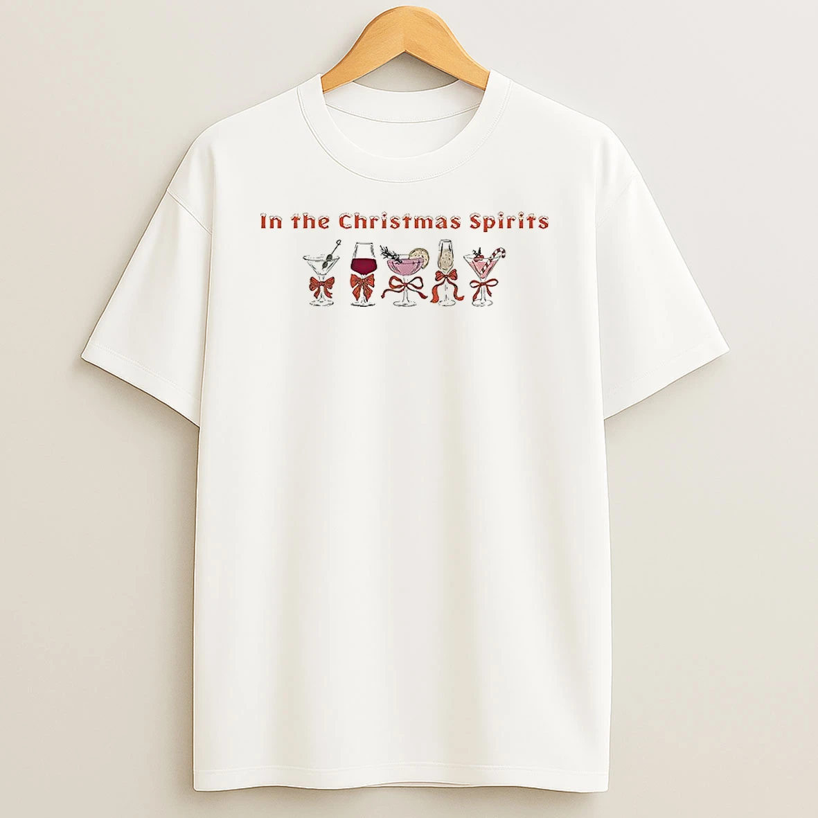 In The Christmas Spirits Cocktail Glass With Bow Christmas T Shirt