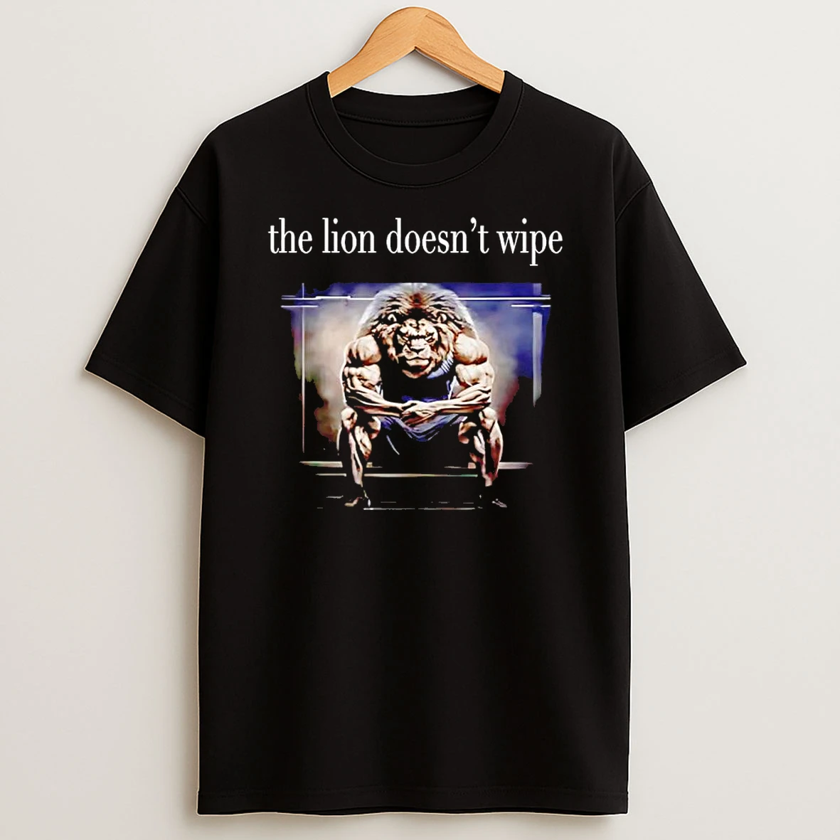 The Lion Doesnt Wipe Muscle T Shirt
