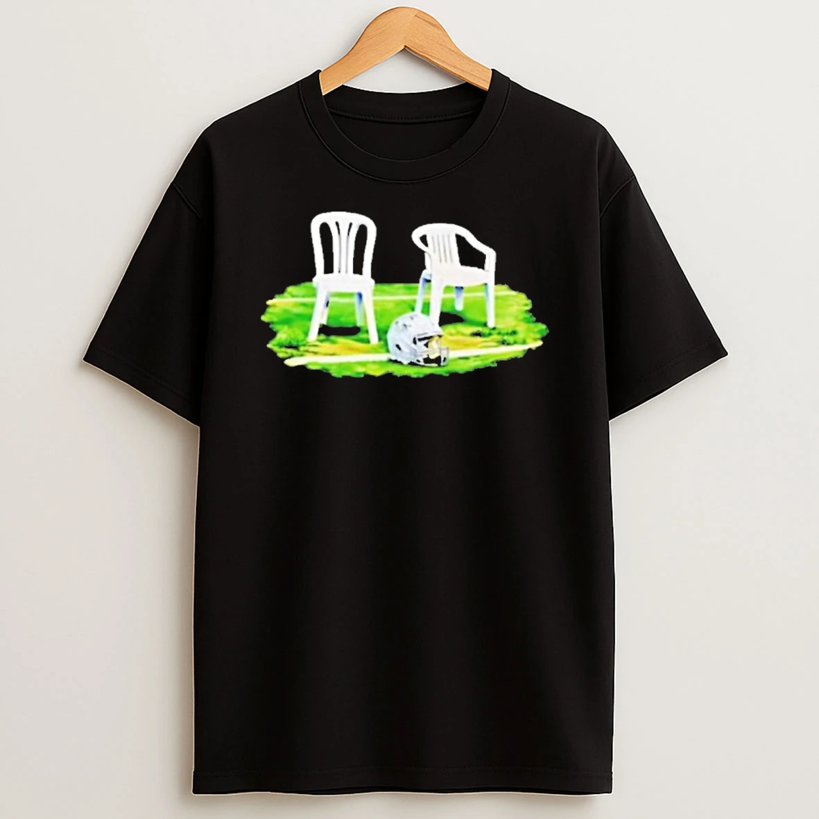 White Plastic Chairs And Football Helmet On Grass Field T Shirt