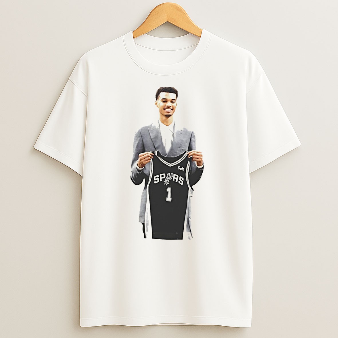 Original Victor Wembanyama Is Holding 1 Jersey For The San Antonio Spurs Basketball Nba 2026 T Shirt