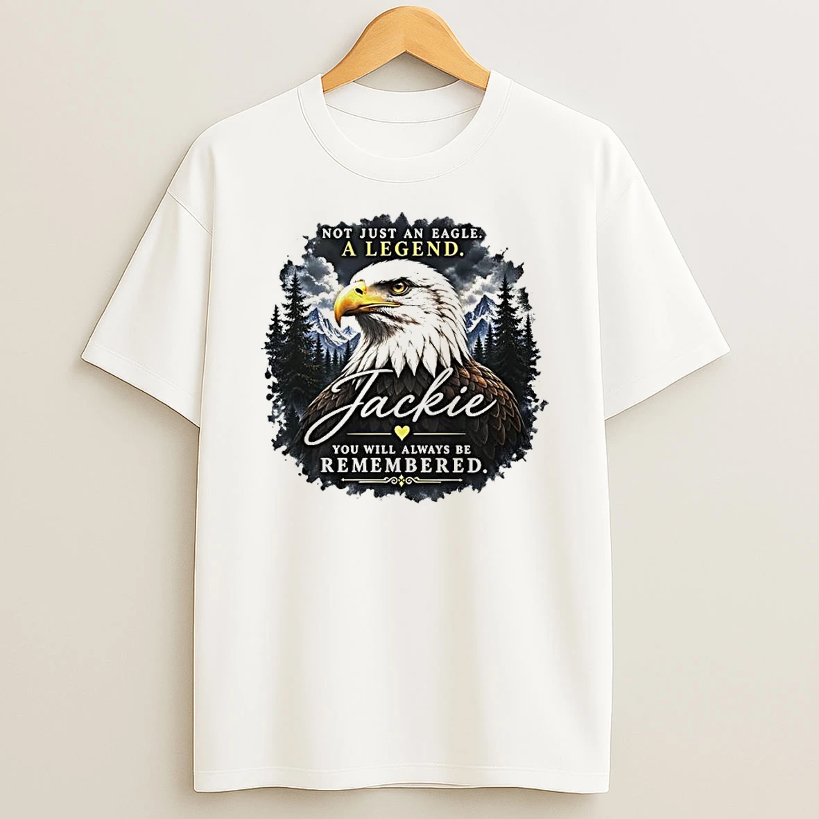 Officials Not Just An Eagle A Legend Jackie You Will Always Be Remembered Bird Head Pine Forest Mountains Watercolor T Shirt Sweatshirt