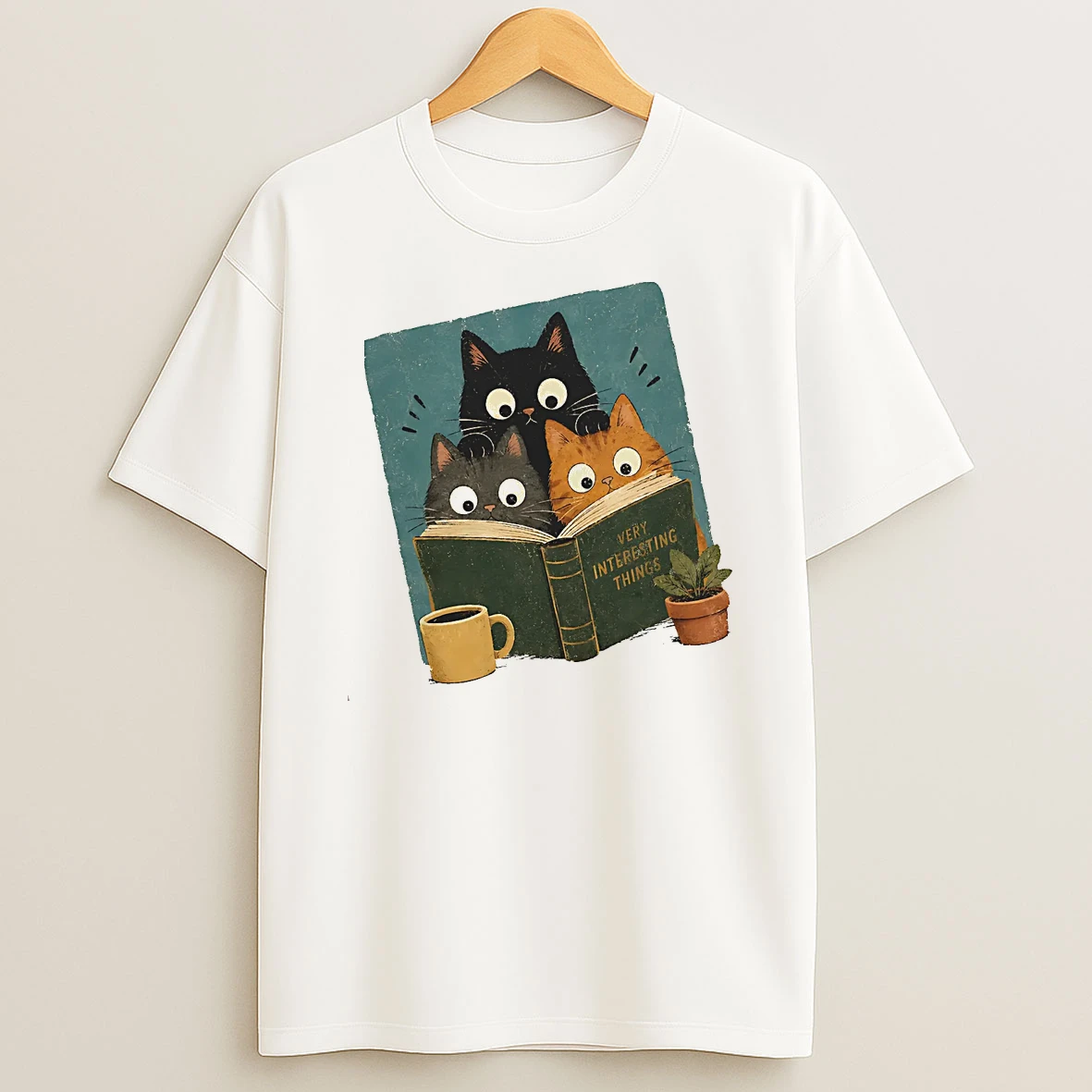 Officials Three Cats Reading Very Interesting Things Book Coffee And Plant T Shirt Sweatshirt