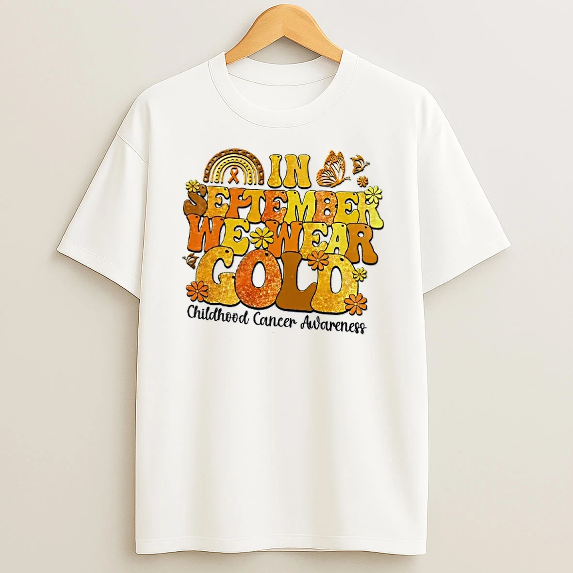 Officials In September We Wear Gold Childhood Cancer Awareness Groovy Rainbow Ribbon Butterflies Flowers T Shirt Sweatshirt